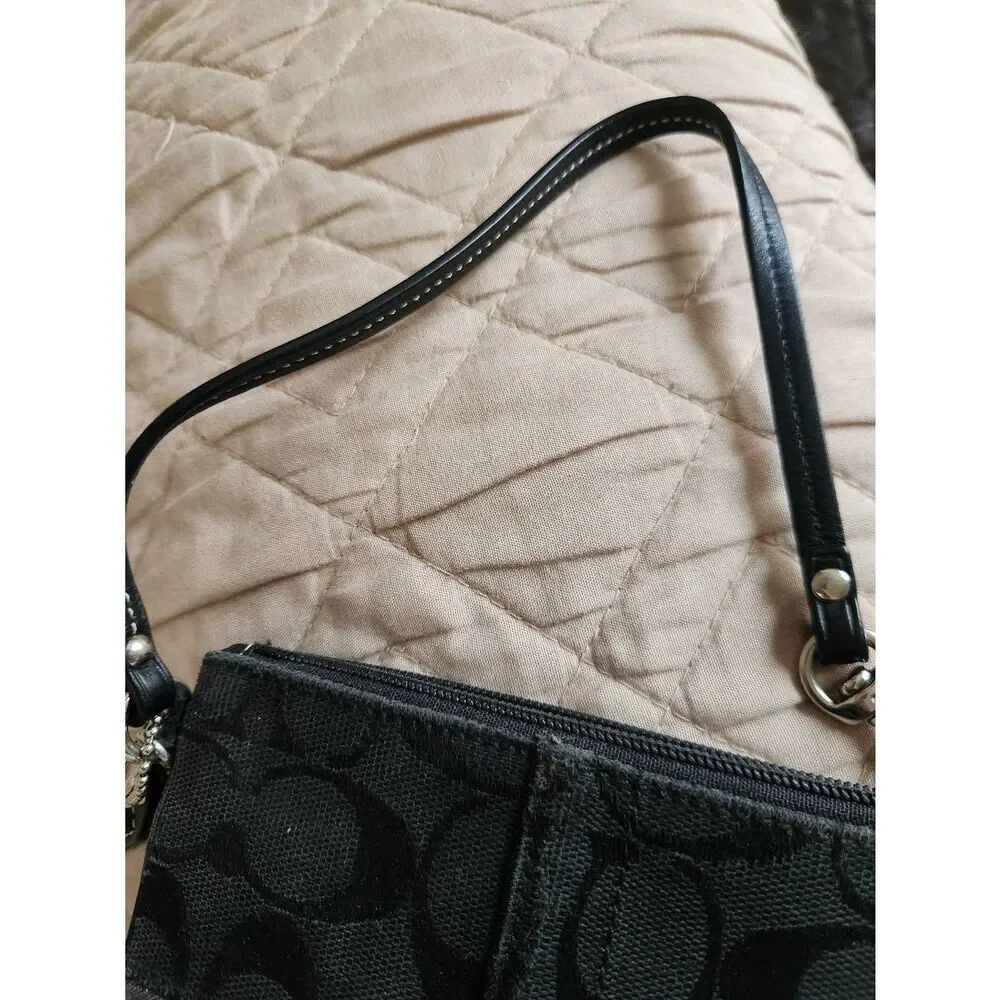 Coach black Signature Jacquard small Zip Wristlet with 65th anniversary lining